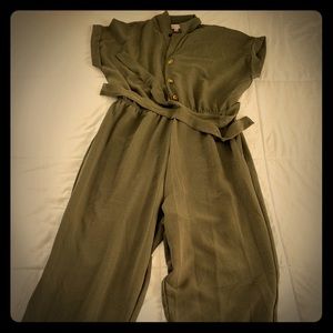 2 green jumpers and a orange top